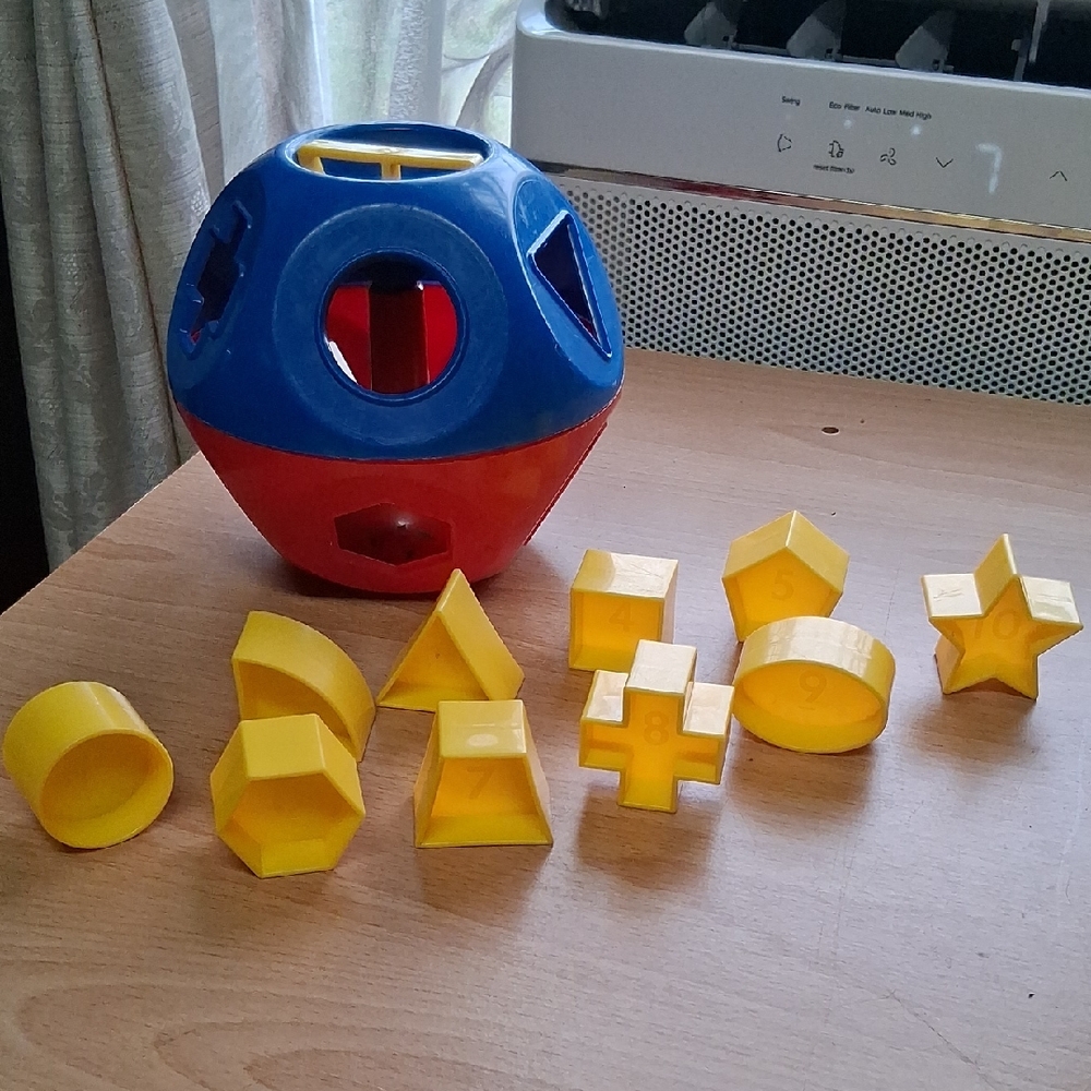 Tupperware Red and Blue Shape Sorter with Yellow Shapes